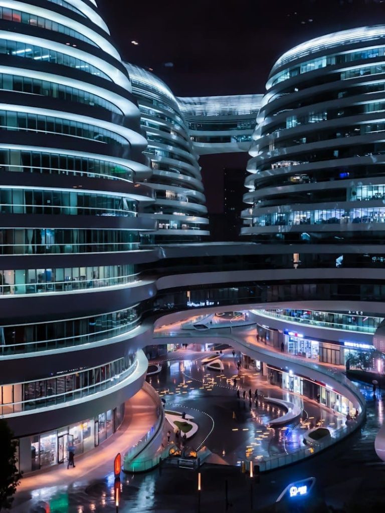 Futuristic city architecture symbolizing the future of AI and technology investment in 2025